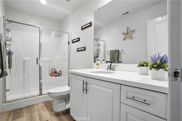 11715 Periwinkle Pl, Jurupa Valley, CA 91752 - full bath with wood finished floors, vanity, and a stall shower