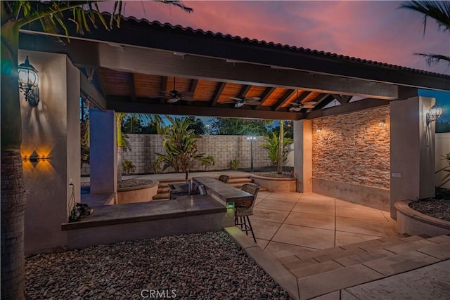11715 Periwinkle Pl, Jurupa Valley, CA 91752 - fenced backyard featuring a patio and a ceiling fan