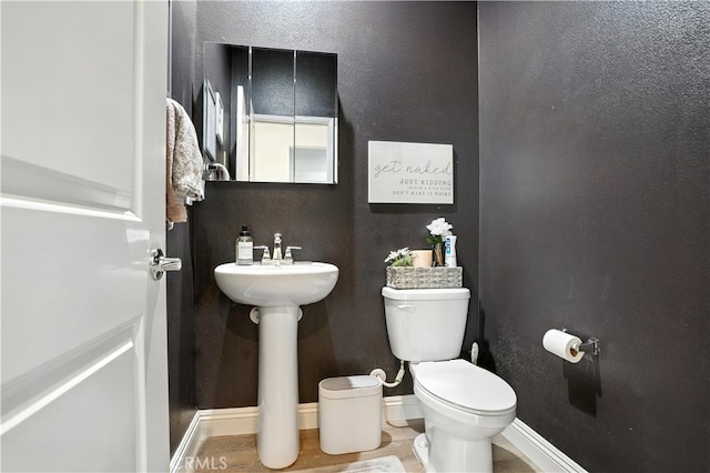 11715 Periwinkle Pl, Jurupa Valley, CA 91752 - bathroom with toilet and a textured wall