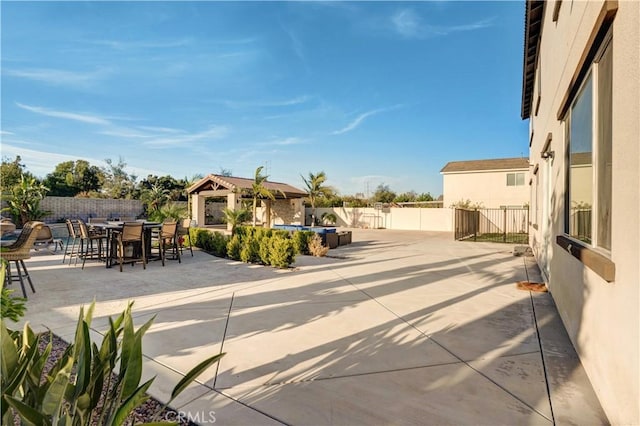 11715 Periwinkle Pl, Jurupa Valley, CA 91752 - view of patio / terrace featuring a gazebo, outdoor dining space, and a swimming pool