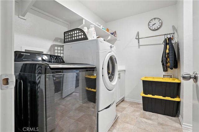11715 Periwinkle Pl, Jurupa Valley, CA 91752 - washroom with washer and dryer and cabinet space
