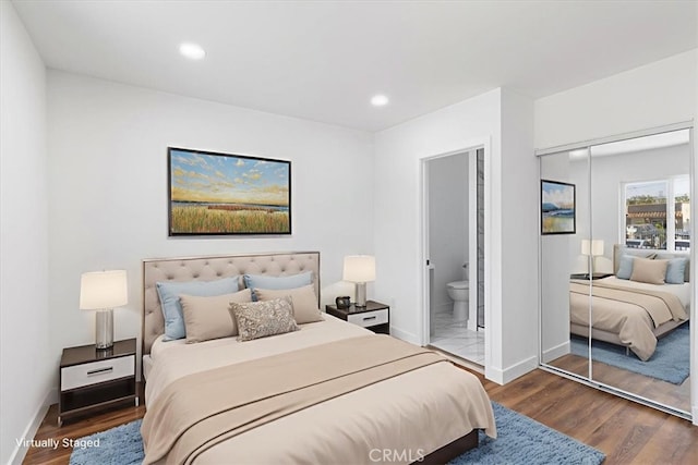 727 E 94th St, Los Angeles, CA 90002 - bedroom featuring wood finished floors, a closet, recessed lighting, and connected bathroom
