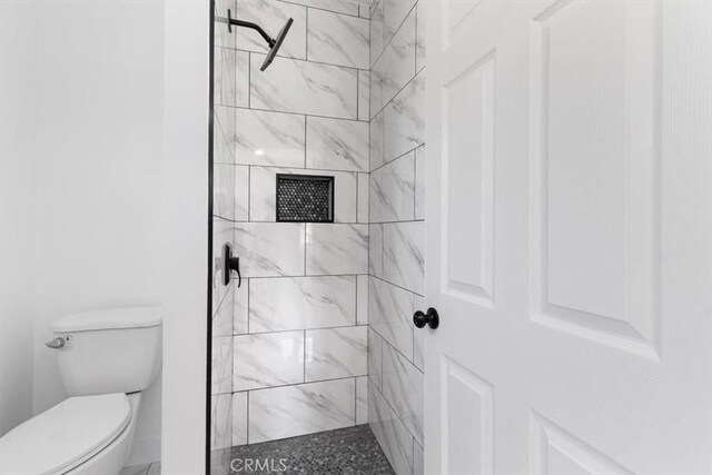 727 E 94th St, Los Angeles, CA 90002 - bathroom with a shower stall and toilet