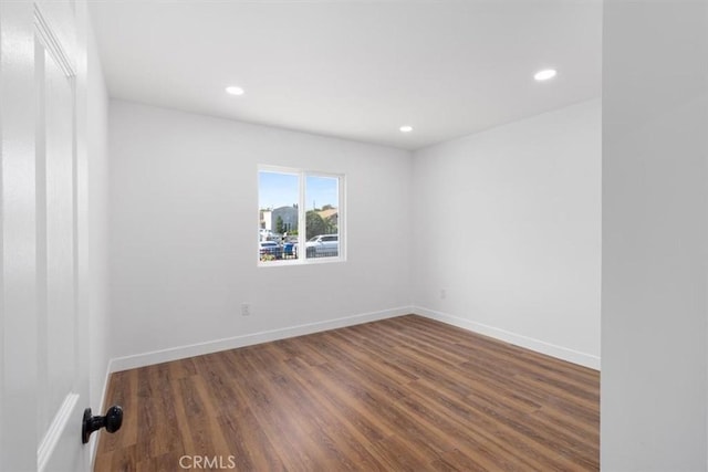 727 E 94th St, Los Angeles, CA 90002 - spare room with recessed lighting and wood finished floors