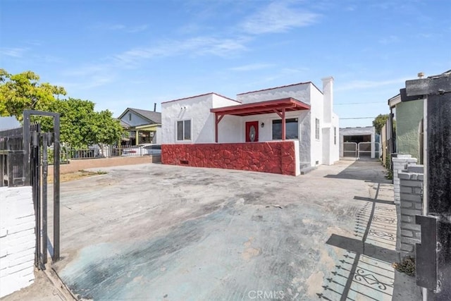 727 E 94th St, Los Angeles, CA 90002 - modern home with stucco siding