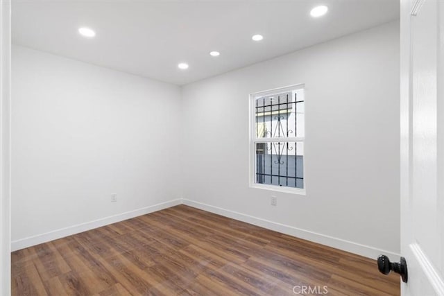 727 E 94th St, Los Angeles, CA 90002 - unfurnished room with dark wood finished floors and recessed lighting