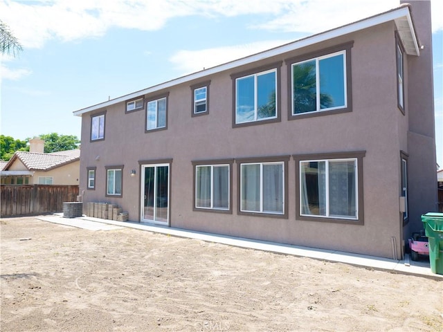 1870 Rosemont Cir, San Jacinto, CA 92583 - rear view of house with stucco siding