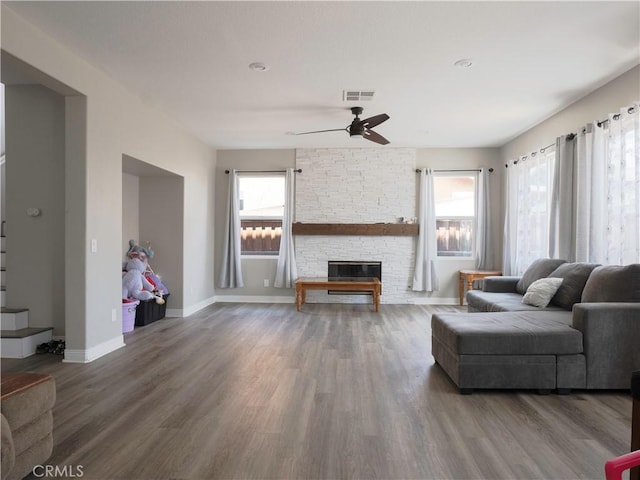 1870 Rosemont Cir, San Jacinto, CA 92583 - living area with ceiling fan, a fireplace, and wood finished floors