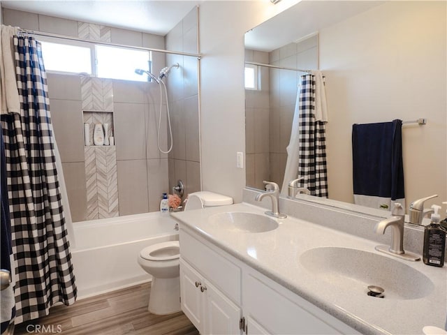 1870 Rosemont Cir, San Jacinto, CA 92583 - full bath with shower / bath combination with curtain, healthy amount of natural light, double vanity, and wood finished floors