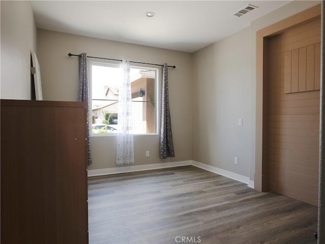 1870 Rosemont Cir, San Jacinto, CA 92583 - unfurnished bedroom featuring wood finished floors and baseboards