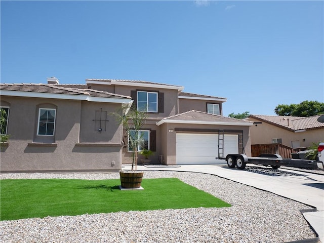 1870 Rosemont Cir, San Jacinto, CA 92583 - view of front of house featuring an attached garage, concrete driveway, stucco siding, and a tiled roof