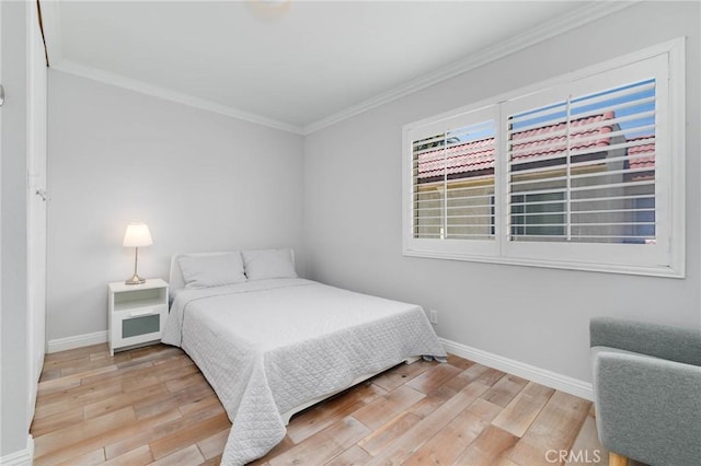 225 W Mission Rd Unit A, San Gabriel, CA 91776 - bedroom featuring crown molding and wood finished floors