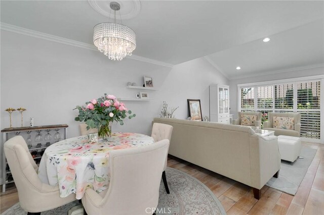 225 W Mission Rd Unit A, San Gabriel, CA 91776 - dining space featuring ornamental molding, wood finished floors, a chandelier, vaulted ceiling, and recessed lighting