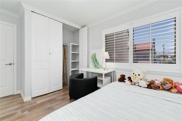 225 W Mission Rd Unit A, San Gabriel, CA 91776 - bedroom with crown molding, light wood-style floors, and a closet