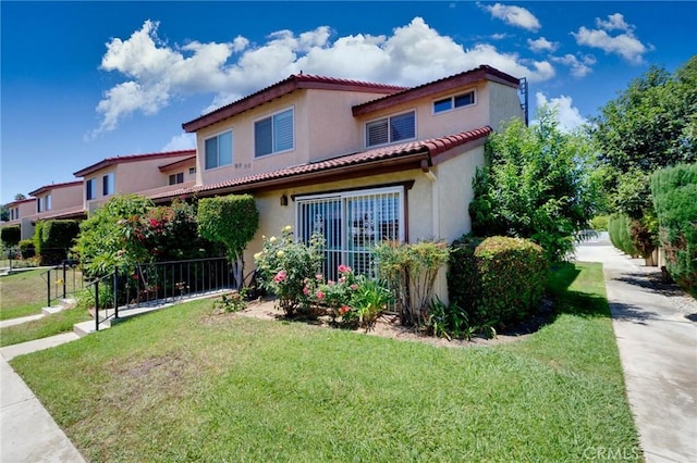 225 W Mission Rd Unit A, San Gabriel, CA 91776 - mediterranean / spanish home featuring a tiled roof and stucco siding