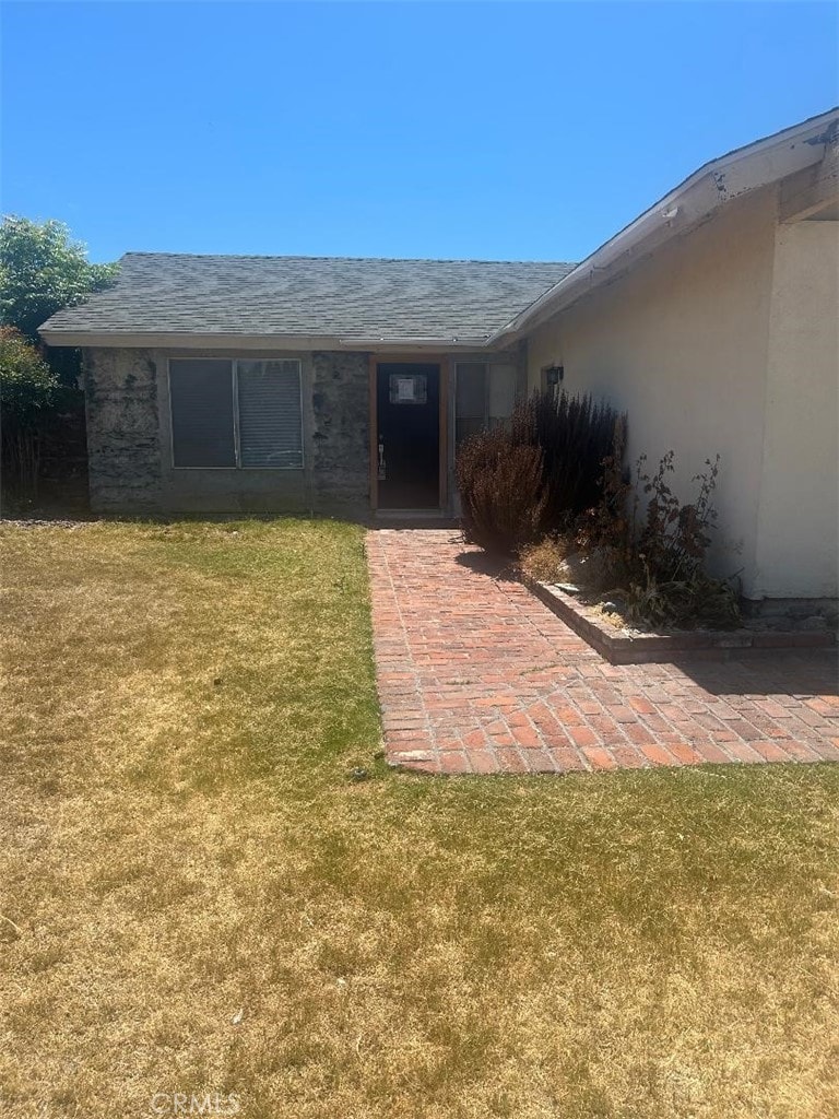 4862 Lori Ann Ln, Irvine, CA 92604 - entrance to property featuring a yard and stucco siding