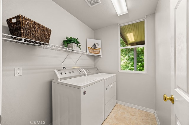 13014 Bermuda Ave, Chino, CA 91710 - washroom featuring separate washer and dryer and baseboards