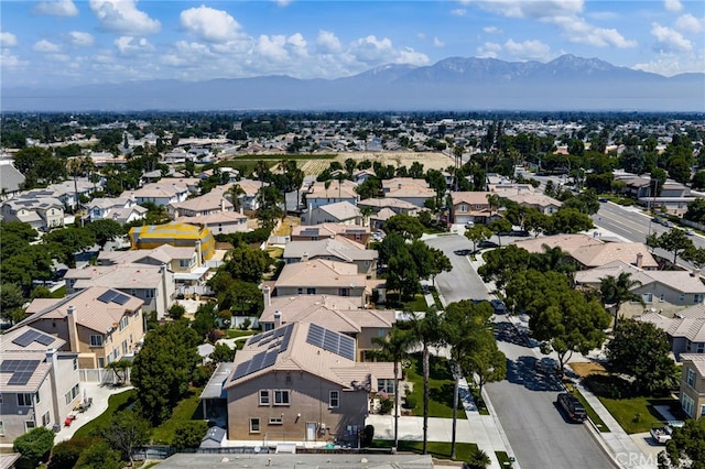 13014 Bermuda Ave, Chino, CA 91710 - aerial perspective of suburban area featuring a mountainous background