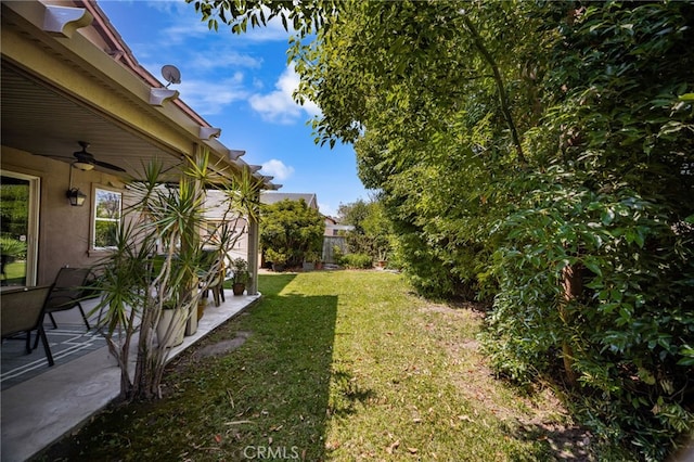 13014 Bermuda Ave, Chino, CA 91710 - view of yard with a ceiling fan and a patio area