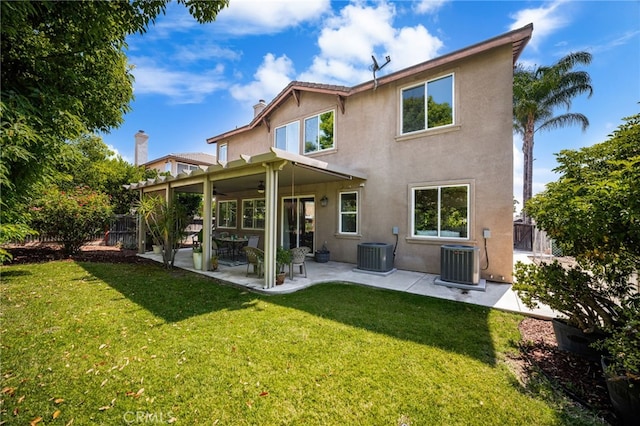 13014 Bermuda Ave, Chino, CA 91710 - back of house with stucco siding, ceiling fan, a patio, and a chimney