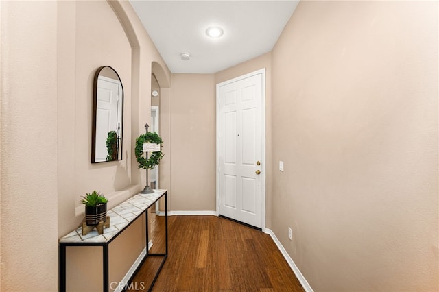 13014 Bermuda Ave, Chino, CA 91710 - entryway with dark wood-style floors and arched walkways