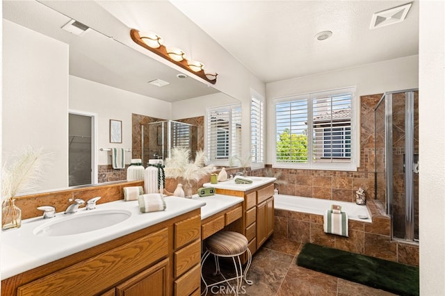 13014 Bermuda Ave, Chino, CA 91710 - bathroom featuring a stall shower, vanity, a bath, and a walk in closet