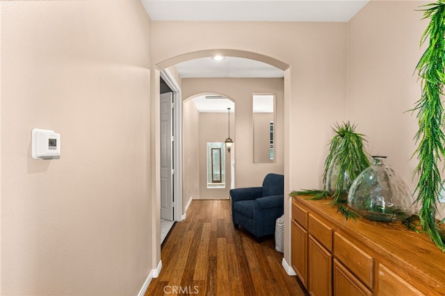 13014 Bermuda Ave, Chino, CA 91710 - corridor featuring arched walkways and dark wood-style floors