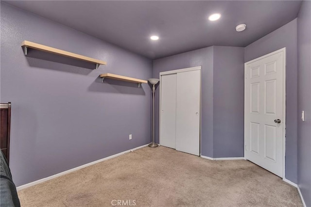 12012 Sproul St Unit 1/2, Norwalk, CA 90650 - unfurnished bedroom featuring carpet flooring, a closet, and recessed lighting