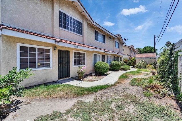 12012 Sproul St Unit 1/2, Norwalk, CA 90650 - back of house featuring stucco siding