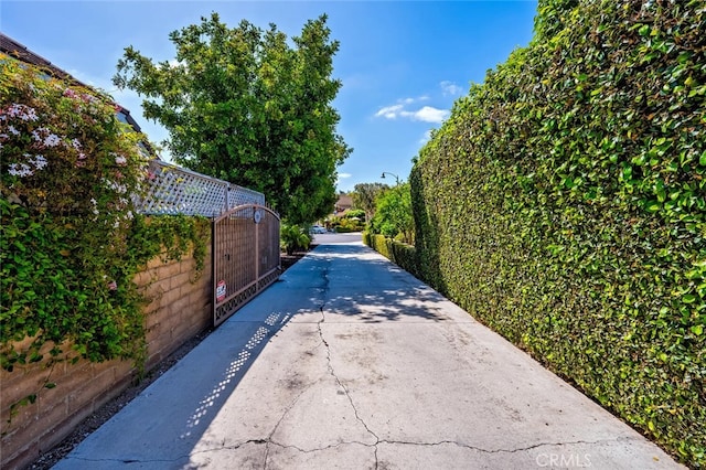 27681 Paseo Esteban, San Juan Capistrano, CA 92675 - view of concrete road with a gate and street lighting