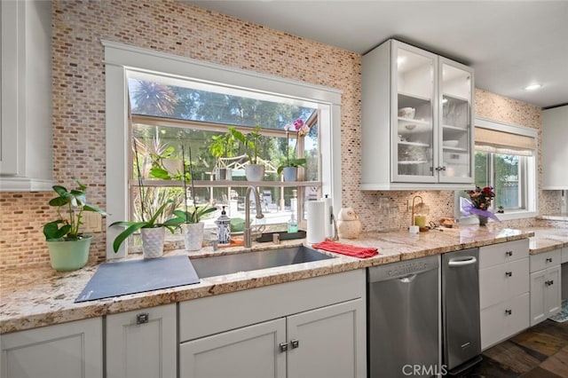 27681 Paseo Esteban, San Juan Capistrano, CA 92675 - kitchen with dishwasher, tasteful backsplash, white cabinetry, glass insert cabinets, and light stone counters