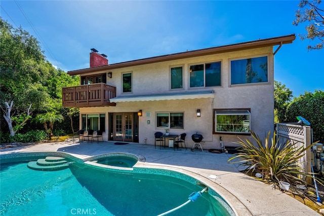 27681 Paseo Esteban, San Juan Capistrano, CA 92675 - back of house with french doors, stucco siding, a patio area, and a balcony