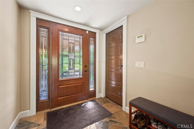 27681 Paseo Esteban, San Juan Capistrano, CA 92675 - foyer with baseboards and stone finish flooring