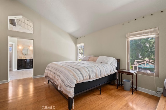 27681 Paseo Esteban, San Juan Capistrano, CA 92675 - bedroom with wood finished floors, multiple windows, high vaulted ceiling, and connected bathroom