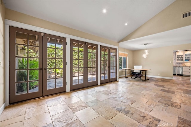 27681 Paseo Esteban, San Juan Capistrano, CA 92675 - entryway with french doors, stone tile flooring, recessed lighting, high vaulted ceiling, and a chandelier