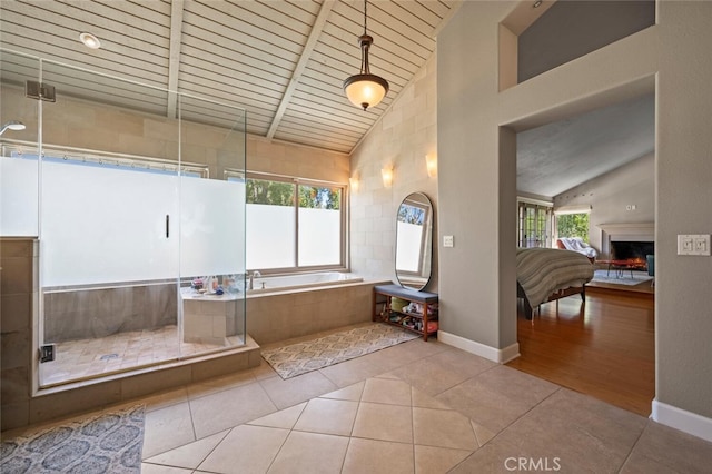 27681 Paseo Esteban, San Juan Capistrano, CA 92675 - full bath featuring a bath, tile patterned floors, a warm lit fireplace, a stall shower, and wood ceiling