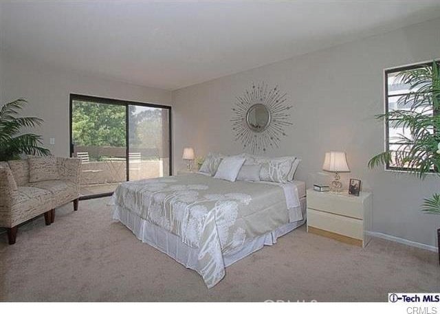 640 S Lake Ave Unit 306, Pasadena, CA 91106 - bedroom featuring access to outside and carpet floors