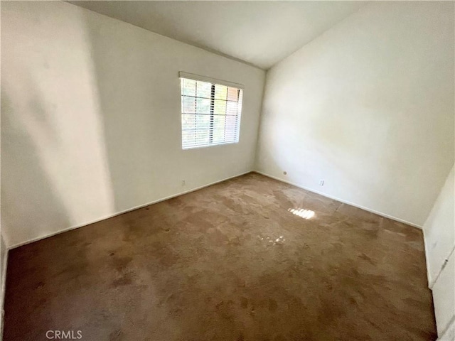 640 S Lake Ave Unit 306, Pasadena, CA 91106 - empty room featuring vaulted ceiling and carpet floors