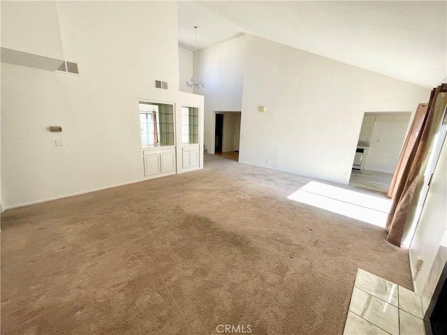 640 S Lake Ave Unit 306, Pasadena, CA 91106 - unfurnished living room with high vaulted ceiling and light colored carpet