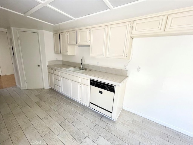640 S Lake Ave Unit 306, Pasadena, CA 91106 - kitchen with dishwasher, tile counters, and light wood-style flooring
