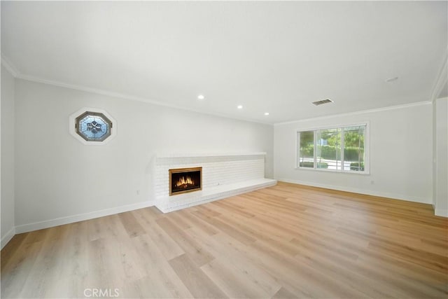 734 Puma Canyon Ln, Glendora, CA 91740 - unfurnished living room with ornamental molding, light wood-style floors, a brick fireplace, and recessed lighting