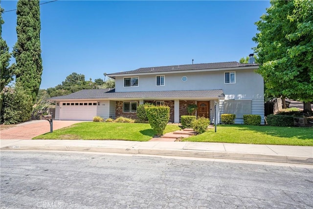 734 Puma Canyon Ln, Glendora, CA 91740 - traditional-style home with concrete driveway, a front yard, a garage, and stucco siding