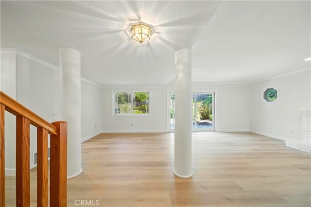 734 Puma Canyon Ln, Glendora, CA 91740 - unfurnished living room with light wood-type flooring, crown molding, and stairway