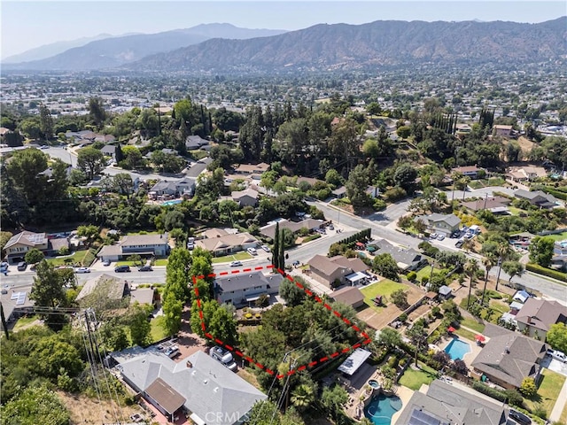734 Puma Canyon Ln, Glendora, CA 91740 - aerial perspective of suburban area with a mountainous background and property boundaries highlighted