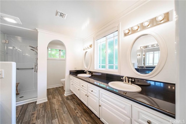 734 Puma Canyon Ln, Glendora, CA 91740 - full bathroom with double vanity, a shower stall, ornamental molding, and wood finished floors