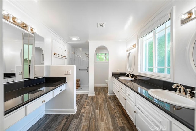 734 Puma Canyon Ln, Glendora, CA 91740 - full bathroom featuring double vanity, a stall shower, wood finished floors, and crown molding