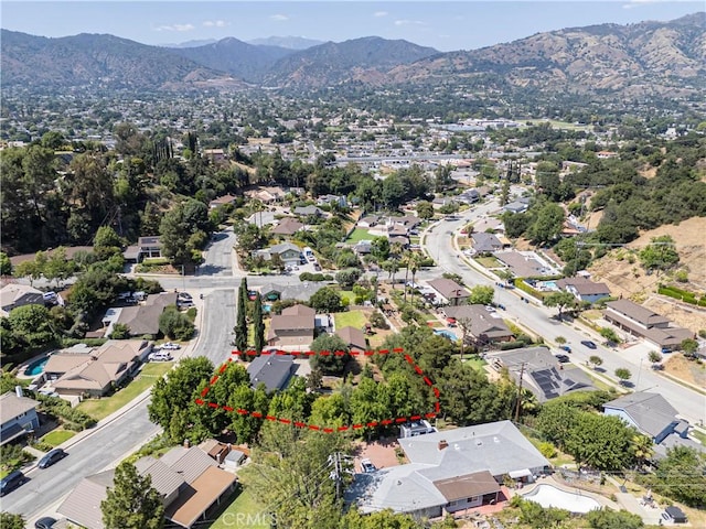 734 Puma Canyon Ln, Glendora, CA 91740 - aerial view of residential area featuring a mountain backdrop and property boundaries highlighted