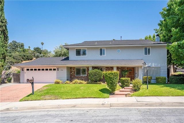 734 Puma Canyon Ln, Glendora, CA 91740 - traditional home featuring an attached garage, a front yard, concrete driveway, and brick siding