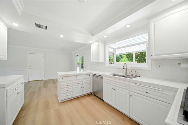 734 Puma Canyon Ln, Glendora, CA 91740 - kitchen featuring stainless steel dishwasher, crown molding, a peninsula, plenty of natural light, and recessed lighting