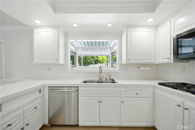 734 Puma Canyon Ln, Glendora, CA 91740 - kitchen with appliances with stainless steel finishes, decorative backsplash, white cabinets, recessed lighting, and ornamental molding